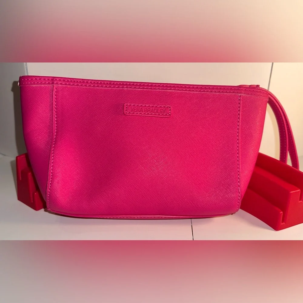 Vera Bradley Pink and White Laser Cut Floral Wristlet.